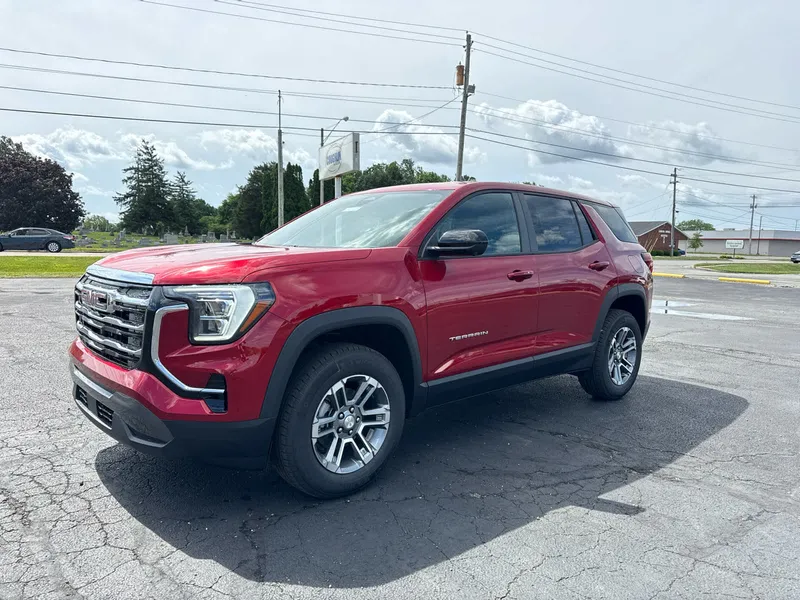 2026 GMC Terrain Elevation in Volcanic Red Tintcoat — front three-quarter view