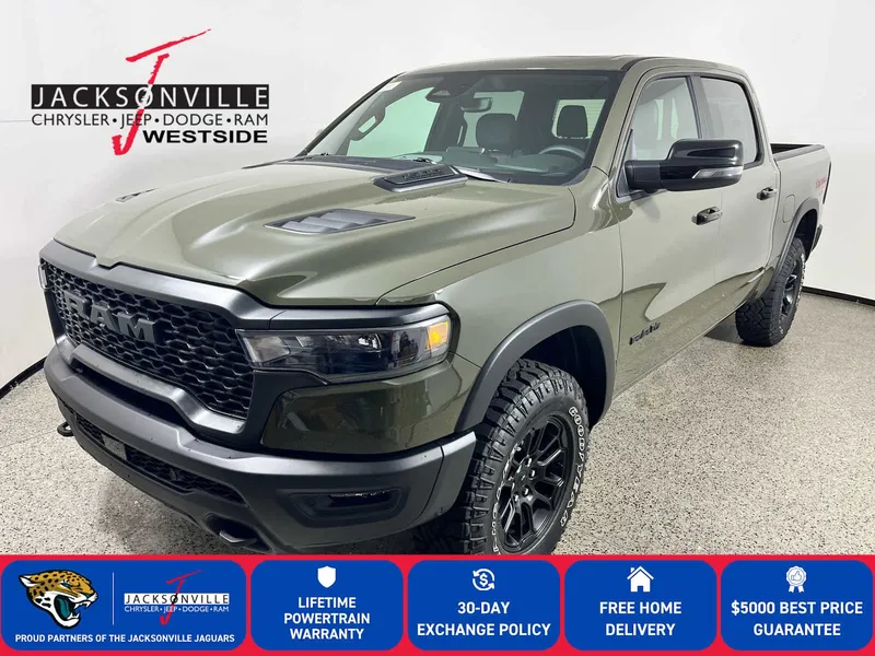 2026 RAM 1500 Rebel in Tank Exterior Paint — front three-quarter view