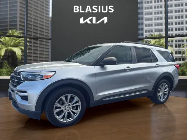 2021 Ford Explorer XLT in Silver Metallic — front three-quarter view