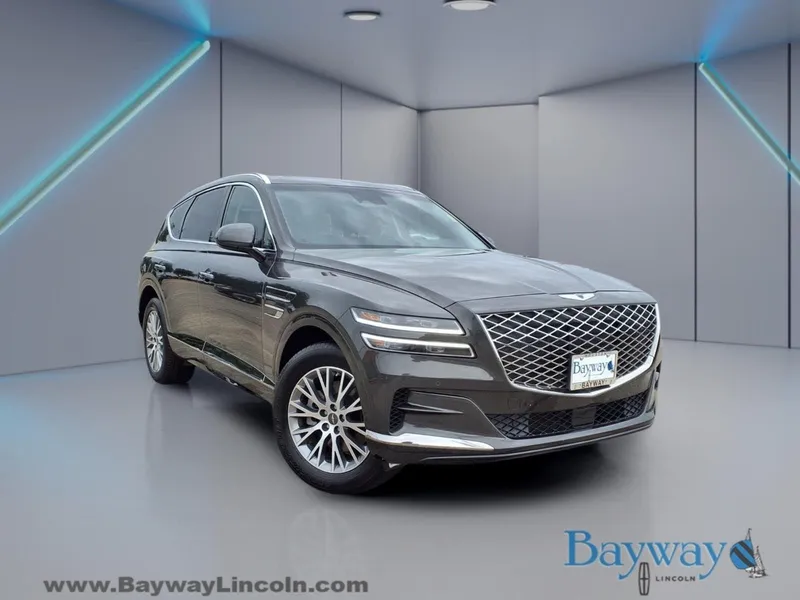 2024 Genesis GV80 2.5T in Makalu Gray — front three-quarter view