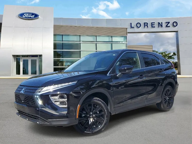 2024 Mitsubishi Eclipse Cross LE in Labrador Black Pearl — front three-quarter view