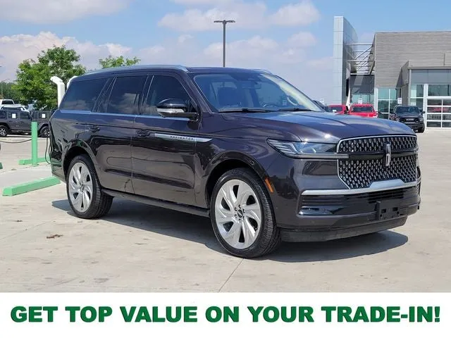 2025 Lincoln Navigator Reserve in Starlight Gray Premium Colorant — front three-quarter view