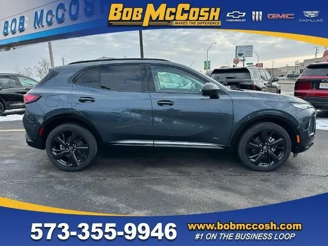 2026 Buick Envision Sport Touring in Quartz Blue Metallic — front three-quarter view