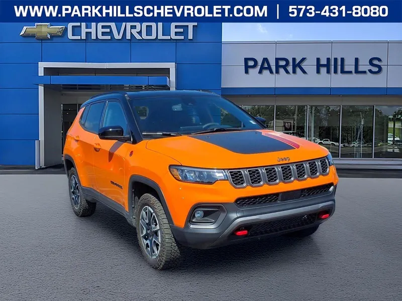 2026 Jeep Compass Trailhawk in Orange — front three-quarter view