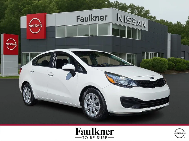 2015 Kia Rio 4dr Sdn Auto LX in Clear White — front three-quarter view