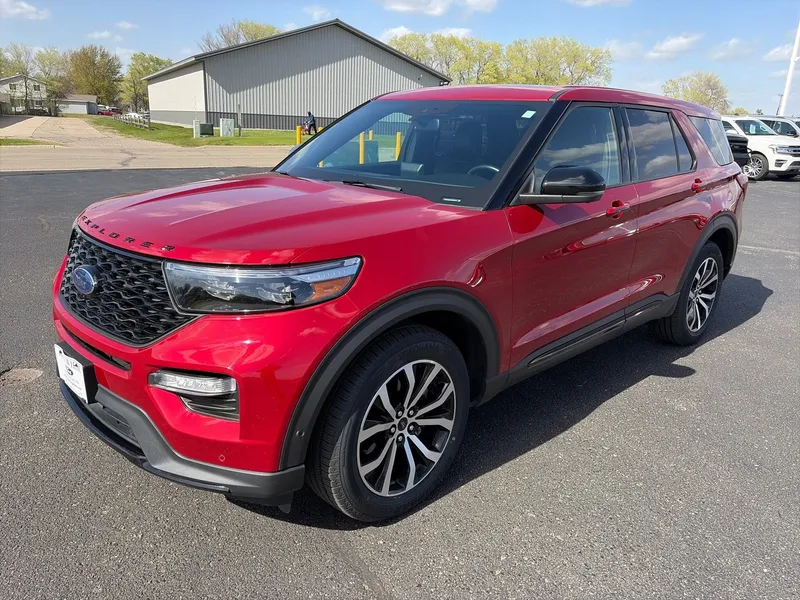 2021 Ford Explorer ST 4WD in Rapid Red Metallic Tinted Clearcoat — front three-quarter view