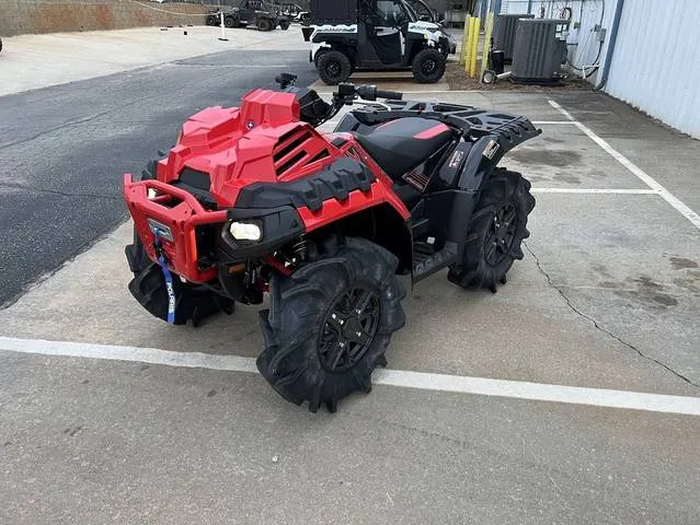 2026 Polaris® Sportsman XP 1000 EPS Mud Edition Indy Red Pearl — front three-quarter view