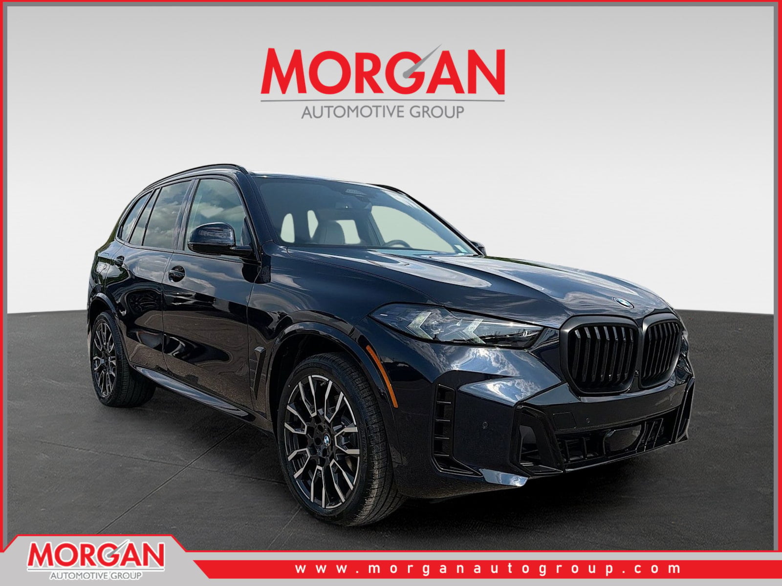 2026 BMW X5 xDrive40i in CARBON BLK MET — front three-quarter view