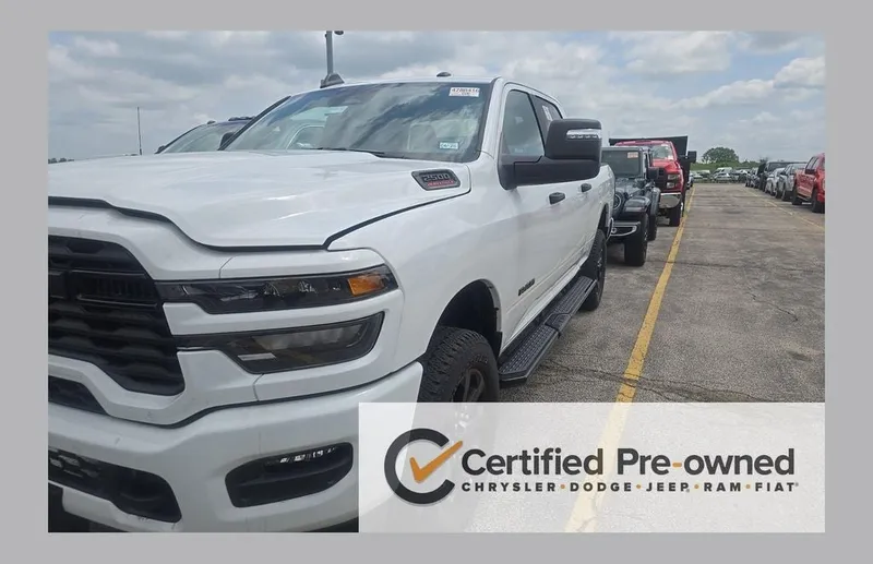 2025 RAM 2500 Big Horn Crew Cab 4x4 6'4' Box in Bright White Clearcoat — front three-quarter view
