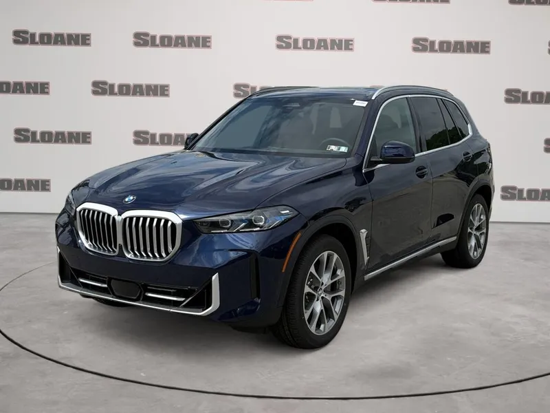 2026 BMW X5 xDrive40i in Tanzanite Blue II Metallic — front three-quarter view