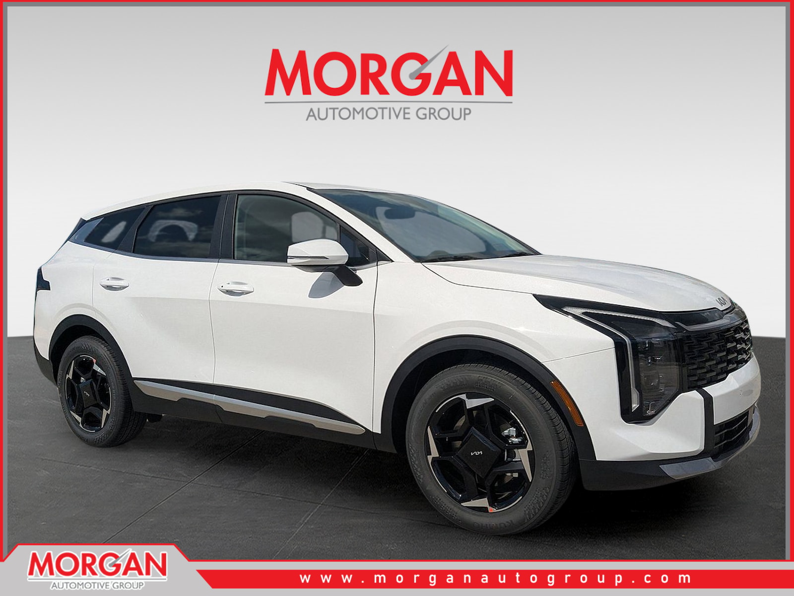 2026 Kia Sportage EX in Glacial White Pearl — front three-quarter view