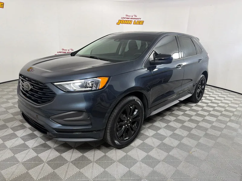 2022 Ford Edge SE in Stone Blue Metallic — front three-quarter view