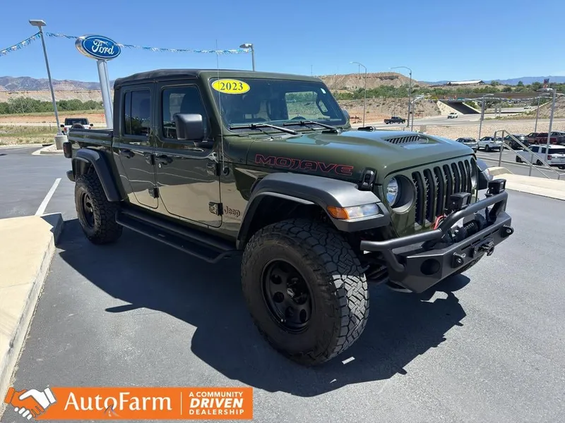 2023 Jeep Gladiator Mojave in Sarge Green Clearcoat — front three-quarter view