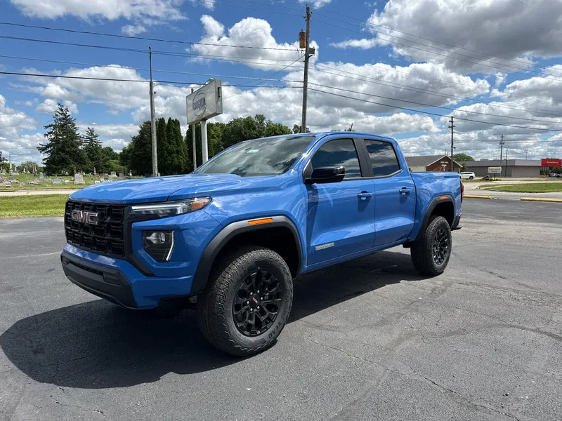 2026 GMC Canyon Elevation in Rapids Metallic — front three-quarter view