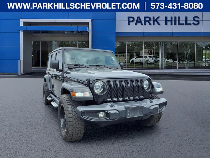 2018 Jeep Wrangler Unlimited Sahara 4x4 in Black — front three-quarter view