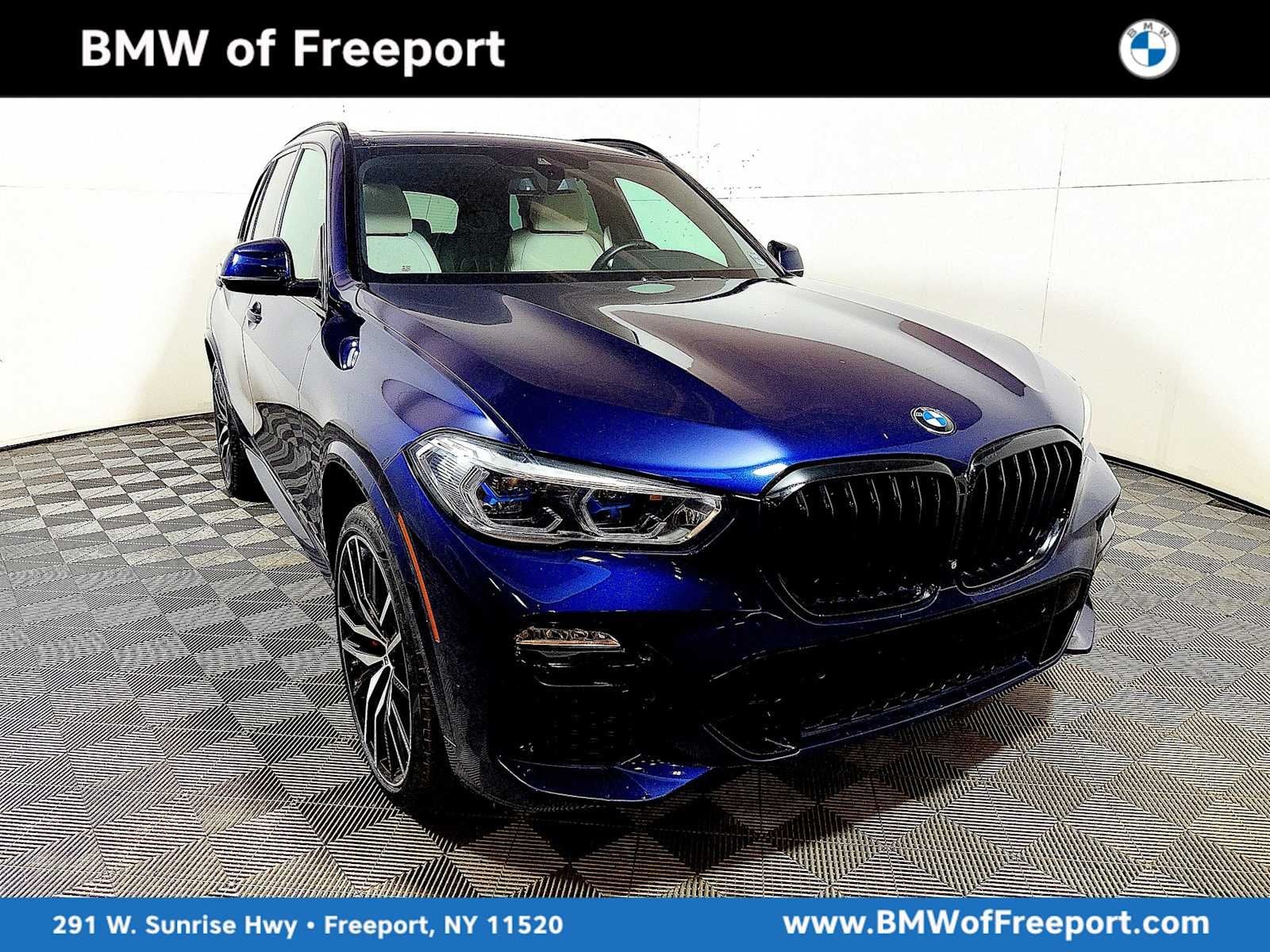 2021 BMW X5 M50i M50i in Tanzanite Blue II Metallic — front three-quarter view