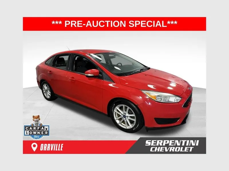 2016 Ford Focus SE in Red — front three-quarter view
