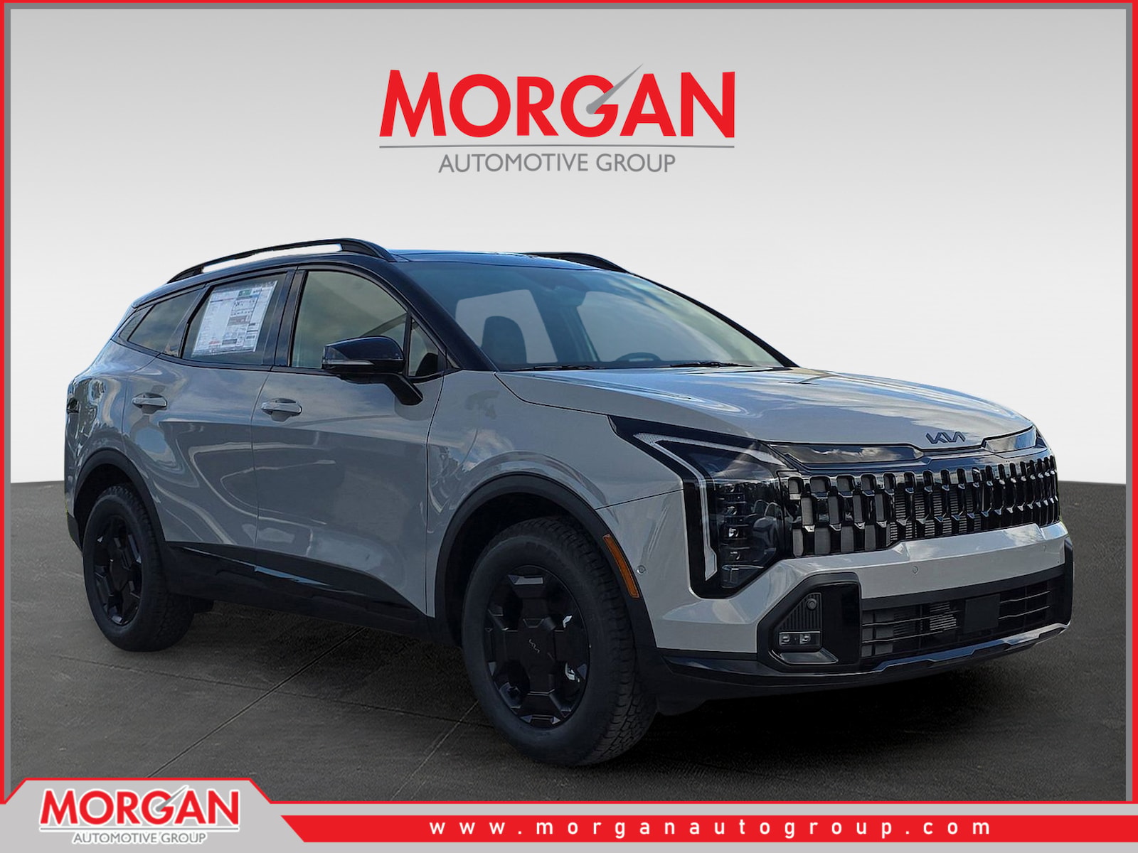 2026 Kia Sportage X-Pro Prestige in Wolf Gray/Black Roof — front three-quarter view