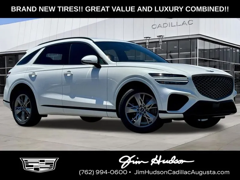 2025 Genesis GV70 3.5T Sport in White — front three-quarter view