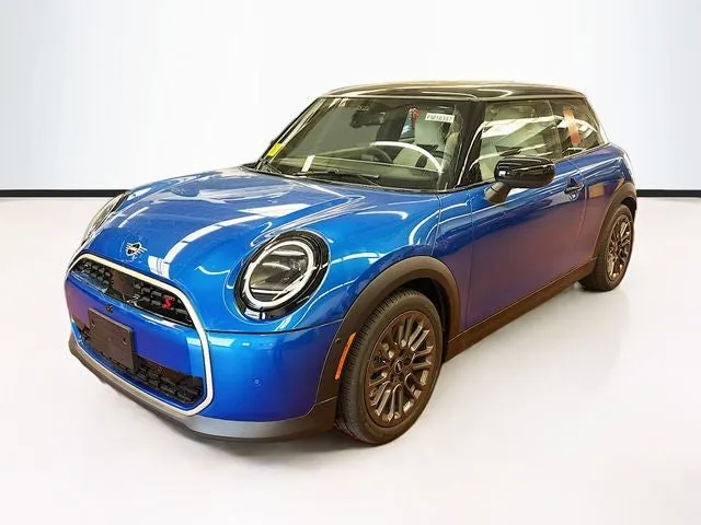 2026 MINI 2 DOOR ICONIC in Icy Sunshine Blue Metallic — front three-quarter view