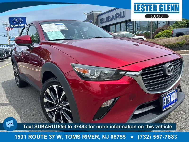 2019 Mazda Mazda CX-3 Touring in Soul Red Crystal Metallic — front three-quarter view