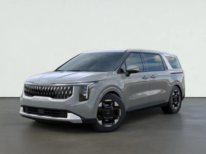 2026 Kia CARNIVAL EX in Ceramic Silver — front three-quarter view