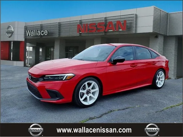 2024 Honda Civic Sport in Red — front three-quarter view