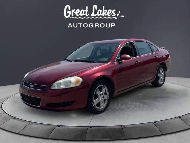 2008 Chevrolet Impala LT in Red Jewel Tintcoat — front three-quarter view