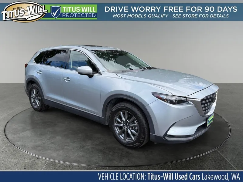 2023 Mazda Mazda CX-9 Touring in Sonic Silver Metallic — front three-quarter view