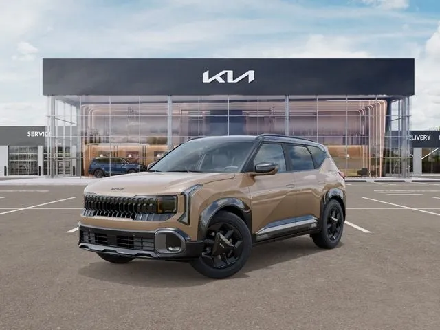 2027 Kia Seltos X-Line in Terrain Brown/Black Roof — front three-quarter view