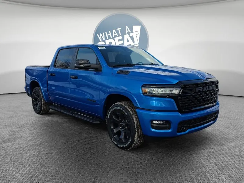 2026 RAM 1500 Big Horn/Lone Star in Hydro Blue Pearlcoat — front three-quarter view