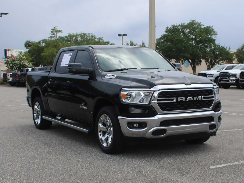 2024 RAM 1500 Big Horn in Diamond Black Crystal Pearlcoat — front three-quarter view