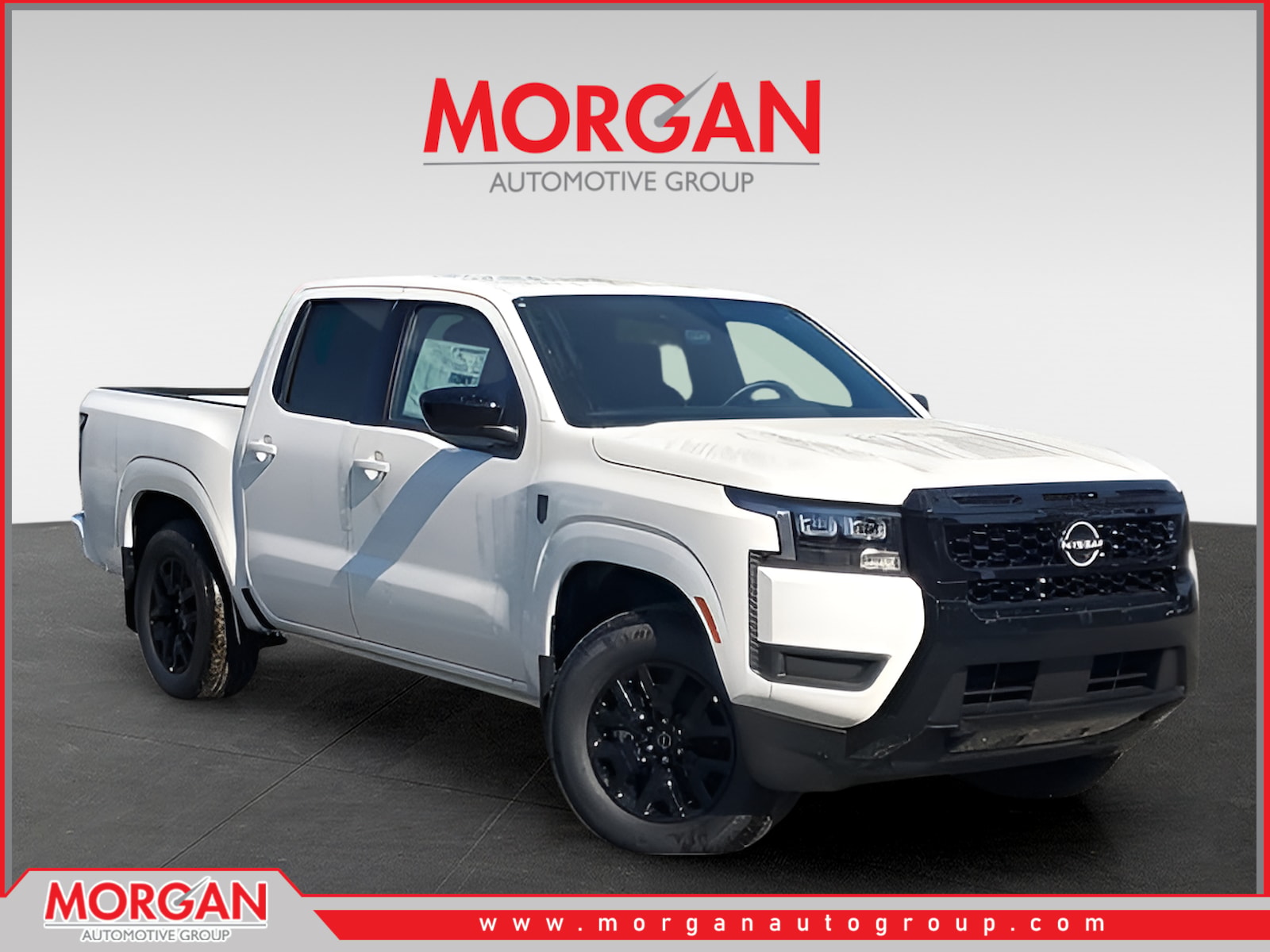 2026 Nissan Frontier SV in White — front three-quarter view