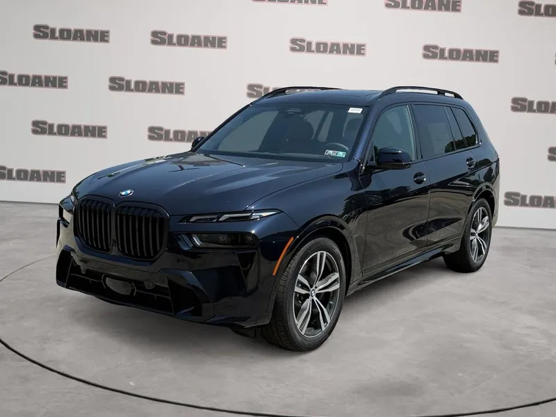2027 BMW X7 xDrive40i in Carbon Black Metallic — front three-quarter view