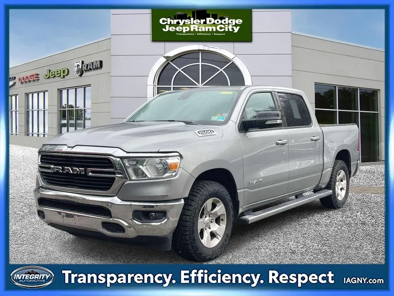 2021 RAM 1500 Big Horn Crew Cab 4x4 5'7' Box in Billet Silver Metallic Clearcoat — front three-quarter view