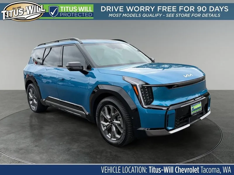 2024 Kia EV9 GT-Line in Blue — front three-quarter view