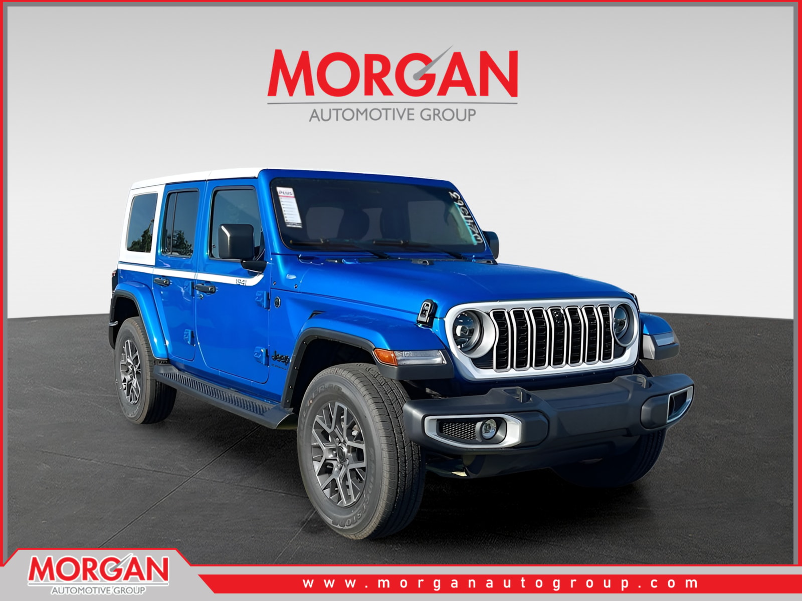 2026 Jeep Wrangler Sahara in Blue — front three-quarter view