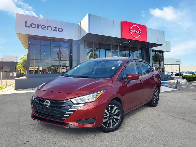2025 Nissan Versa SV in Scarlet Ember Tintcoat — front three-quarter view
