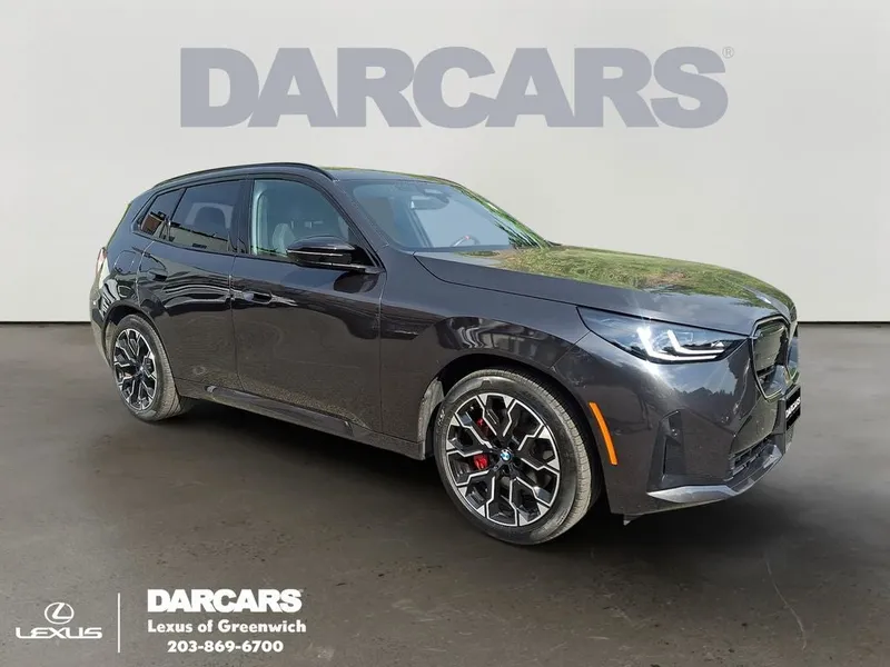 2026 BMW X3 M50 xDrive in Dark Graphite — front three-quarter view