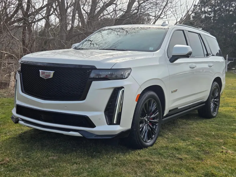 2024 Cadillac Escalade V-Series in Crystal White Tricoat — front three-quarter view
