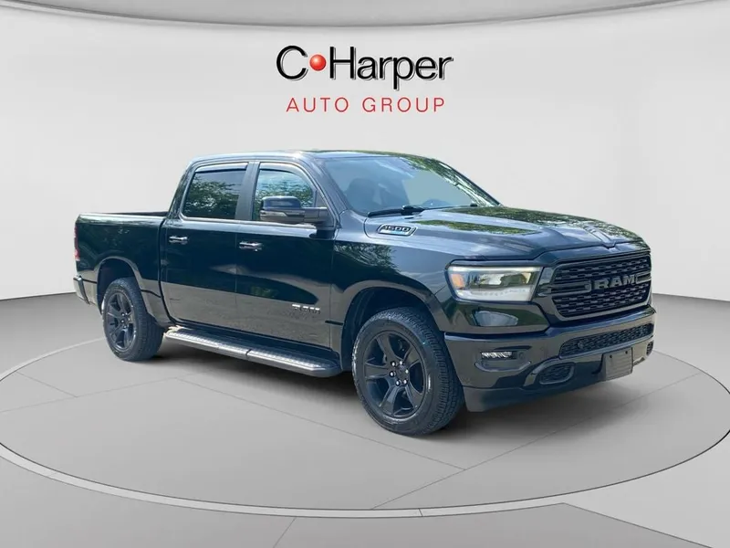 2023 RAM 1500 Big Horn/Lone Star in Diamond Black Crystal Pearlcoat — front three-quarter view