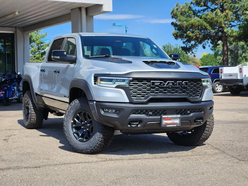 2026 RAM 1500 RAM 1500 RHO CREW CAB 4X4 5'7' BOX in Silver Zynith Exterior Paint — front three-quarter view