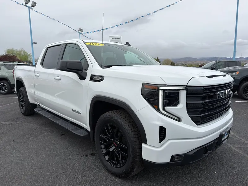 2024 GMC Sierra 1500 Elevation in Summit White — front three-quarter view