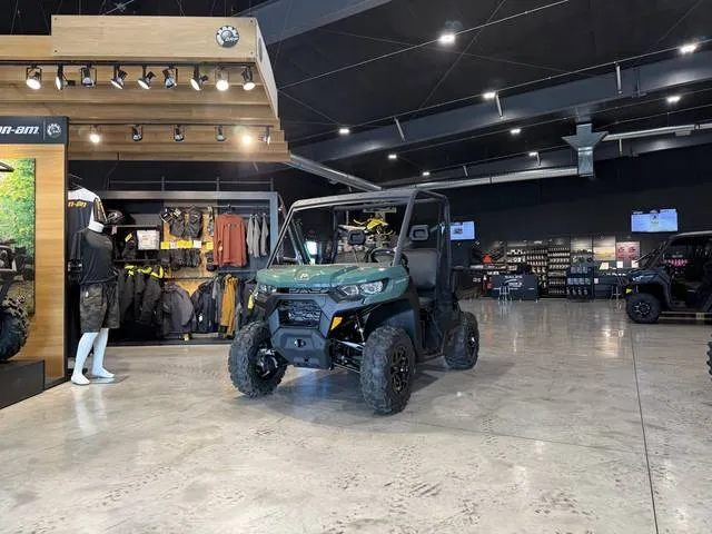2025 Can-Am® Defender DPS HD9 Compass Green — front three-quarter view