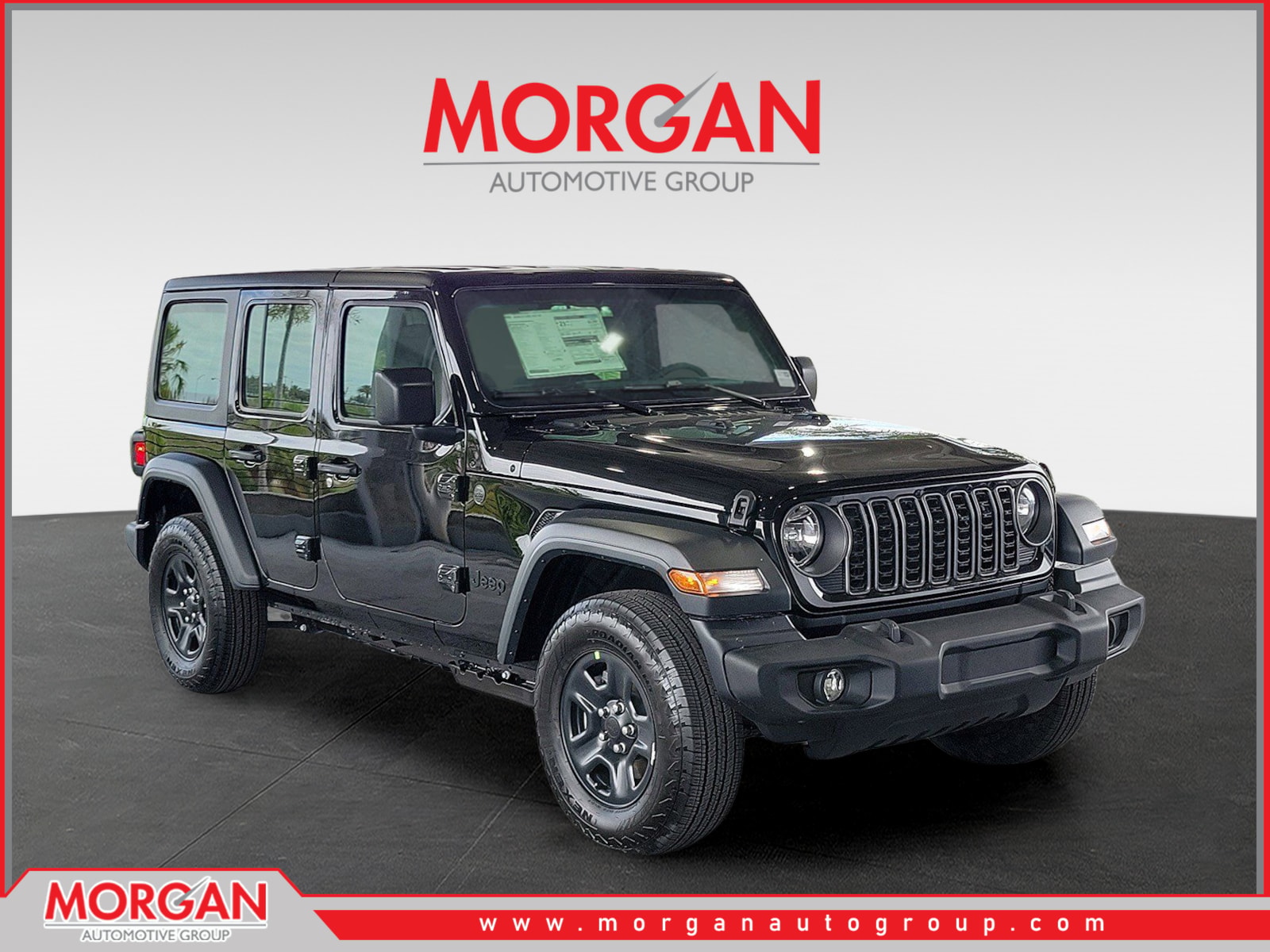 2026 Jeep Wrangler Sport in Black Clearcoat — front three-quarter view
