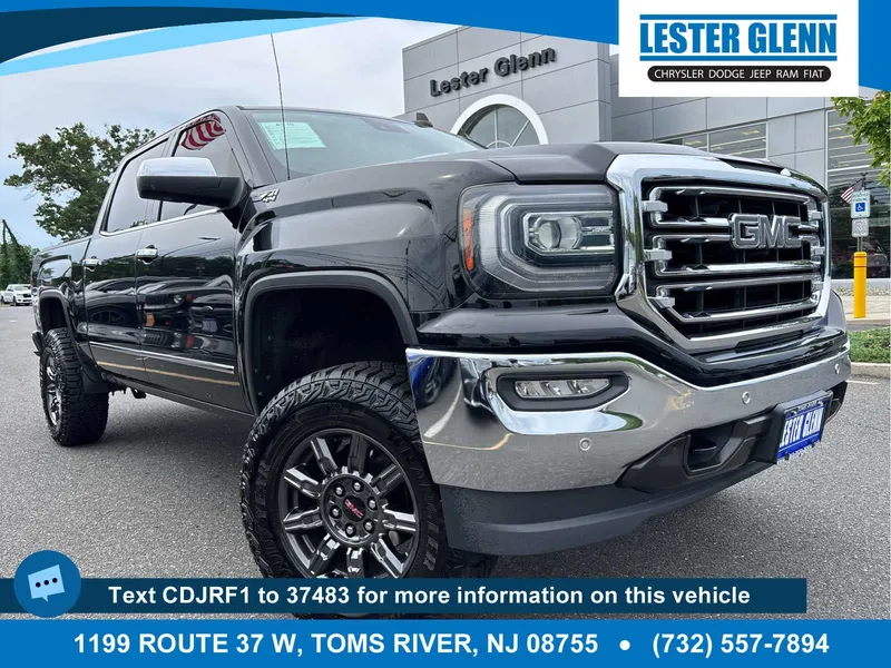 2018 GMC Sierra 1500 SLT in Onyx Black — front three-quarter view