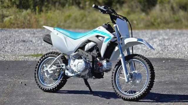 2024 Honda® CRF110F — front three-quarter view