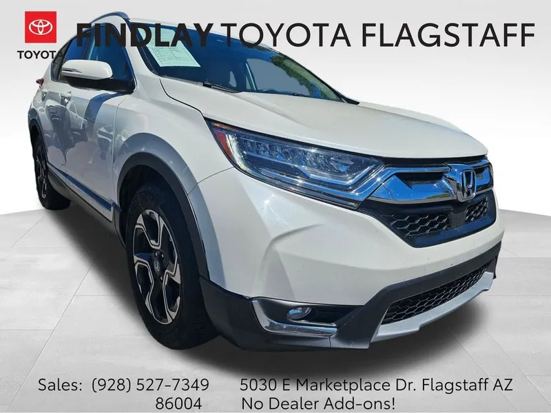 2017 Honda CR-V Touring in White Diamond Pearl — front three-quarter view