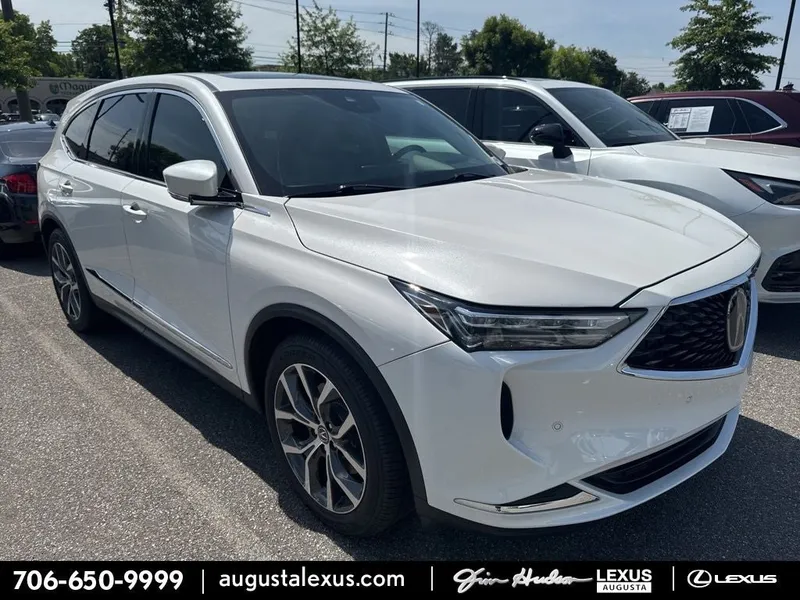 2024 Acura MDX Technology SH-AWD in Platinum White Pearl — front three-quarter view