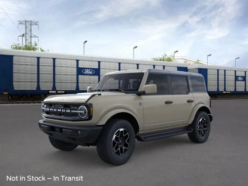 2026 Ford Bronco Outer Banks in Desert Sand — front three-quarter view